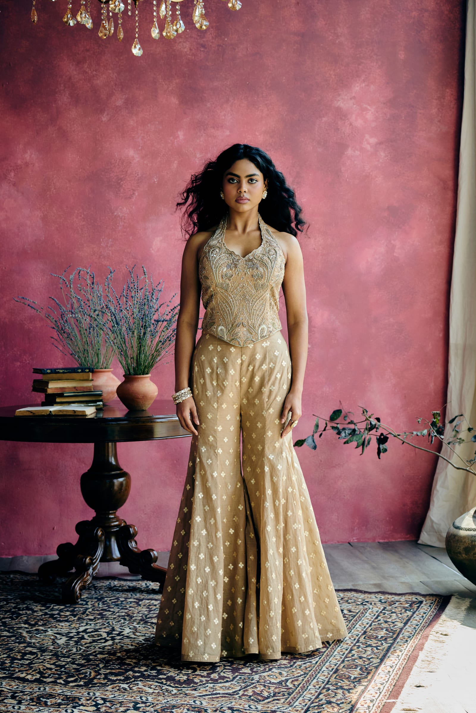 A woman in a beautifully draped lehenga set